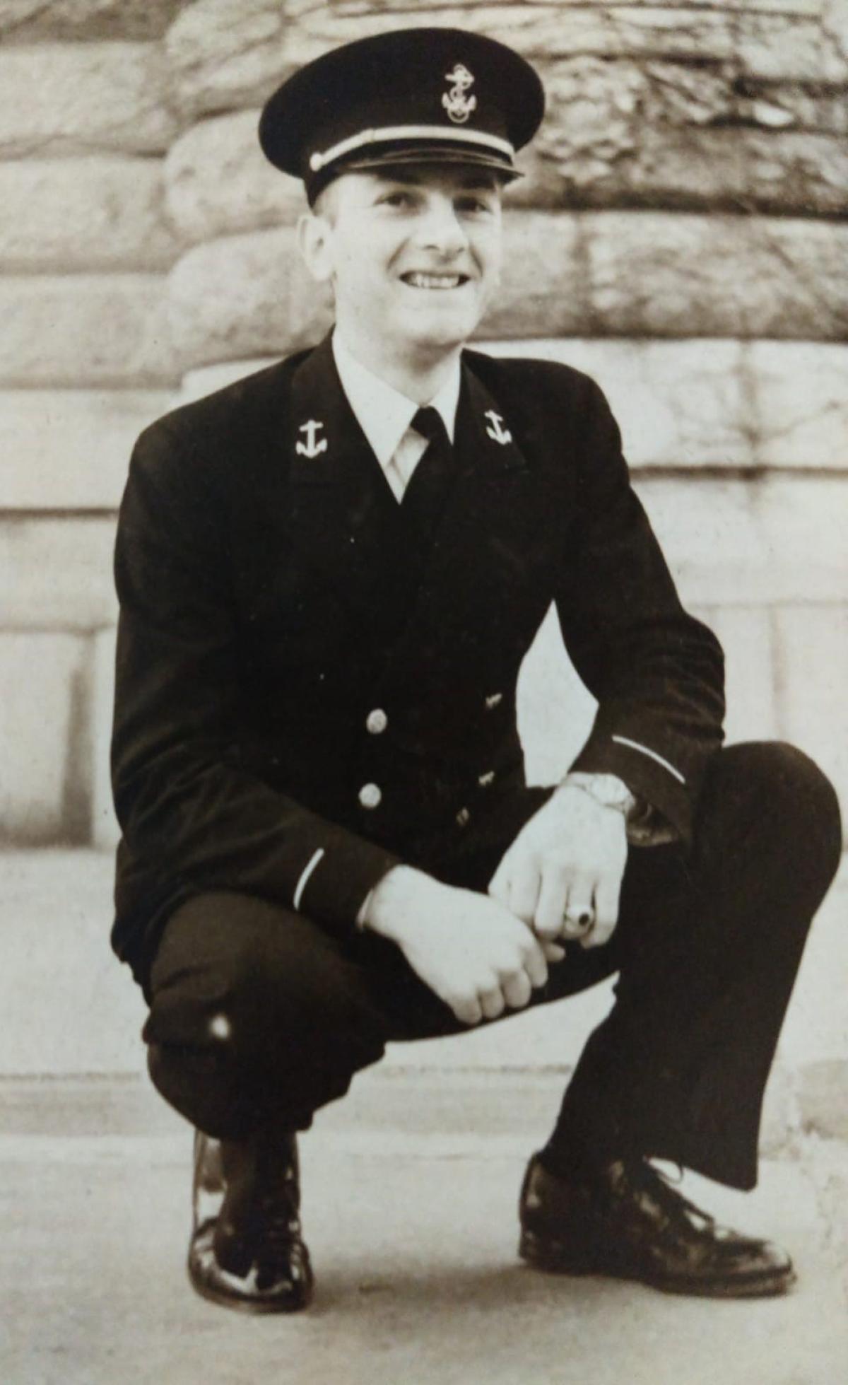photo of a man in military uniform kneeling